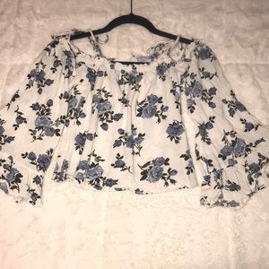 Floral bell sleeved blouse.